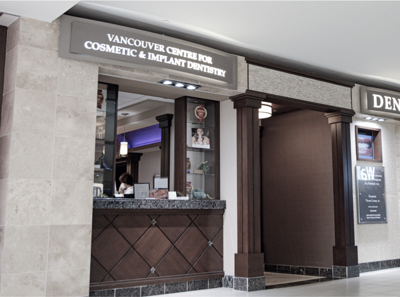 A photograph of the entrance to VCCID, an experienced cosmetic dentistry provider that offers both composite and porcelain veneers in Burnaby
